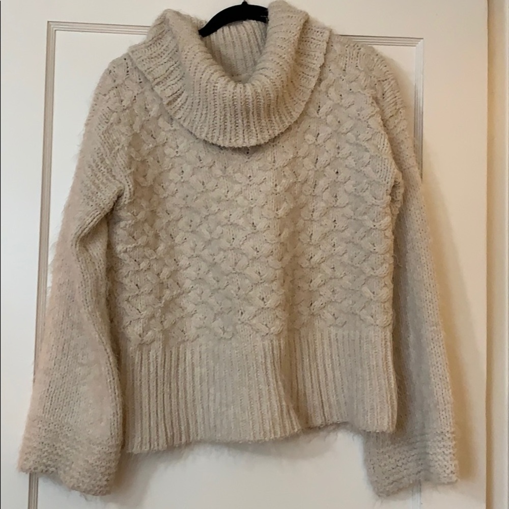 Chunky cowl neck cable knit sweater